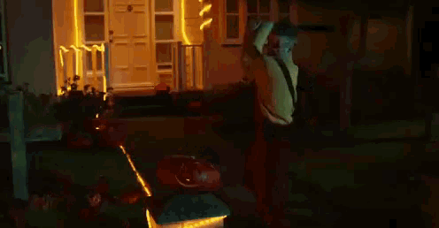 a man with blood on his face is holding a baseball bat over his shoulder .