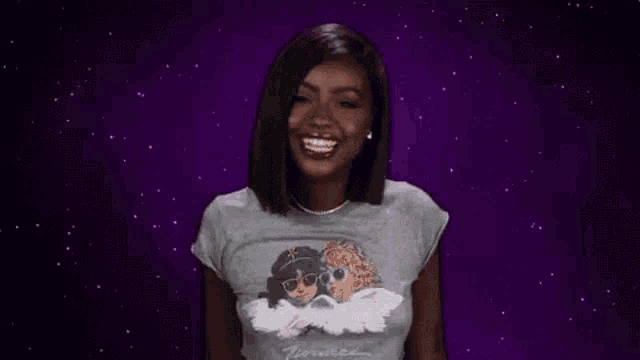 a woman is standing in front of a purple background with her arms outstretched and the words `` yas bitch '' .