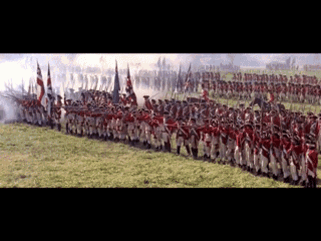a large group of soldiers standing in a field