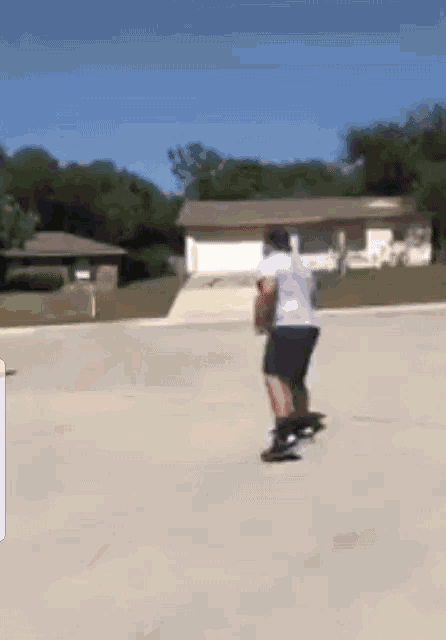 a man is riding a skateboard down a road