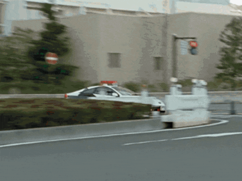a police car with a red light on top of it