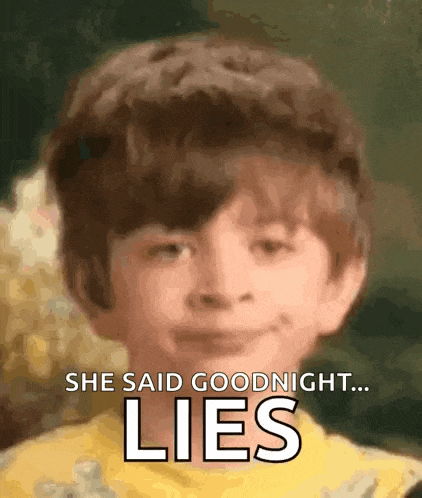 a young boy is smiling with the words she said goodnight lies behind him