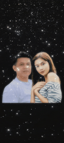 a man and a woman are posing for a picture with hearts floating in the background