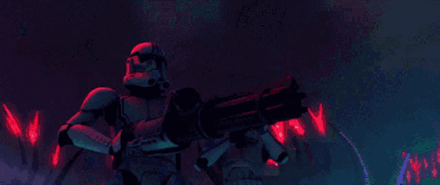 a storm trooper is holding a green light saber