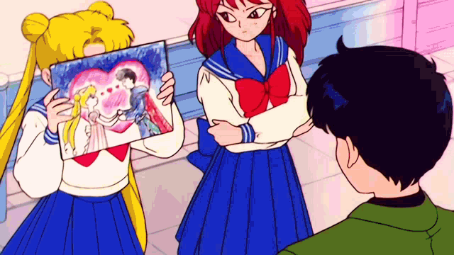 a girl is holding a picture of a man and woman in a heart