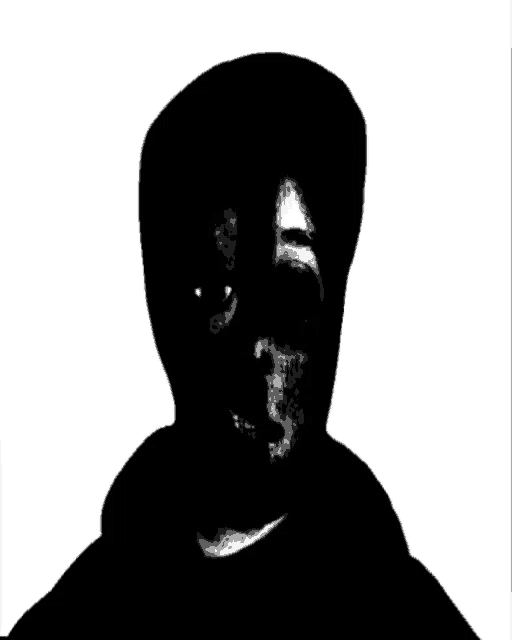 a black and white photo of a person 's face with a hood on