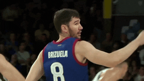 a basketball player with the name brizuela on his jersey