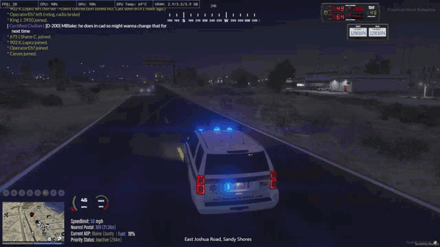 a video game screen shows a police car driving down a road
