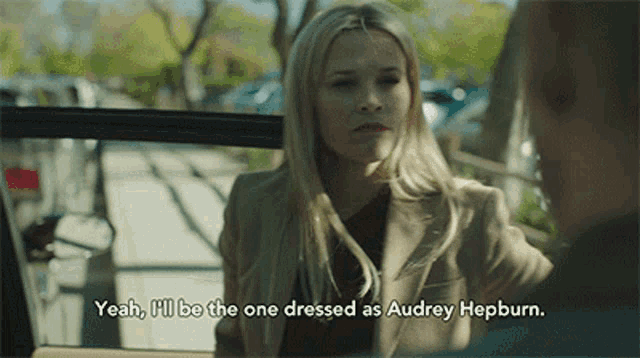 a woman says yeah i 'll be the one dressed as audrey hepburn in a movie