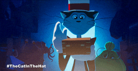 a cat in a top hat is holding a box with #thecatinthehat written on the bottom