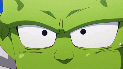 a close up of a green cartoon character 's eyes