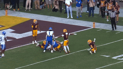 a football player with the number 12 on the back of his shirt