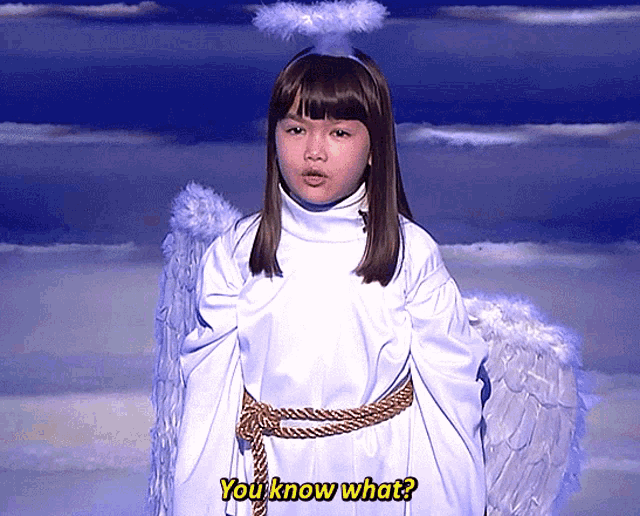 a girl in a white angel costume says you know what