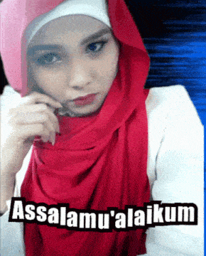 a woman wearing a red scarf with the words assalamu ' alaikum on the bottom