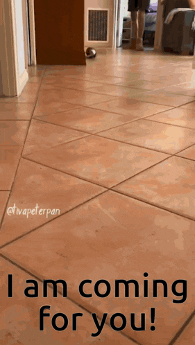 a tiled floor with the words i am coming for you written on it