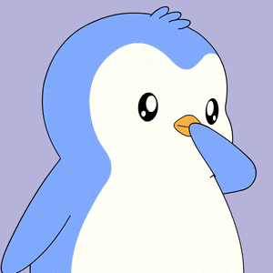 a blue and white penguin with a red heart on its face