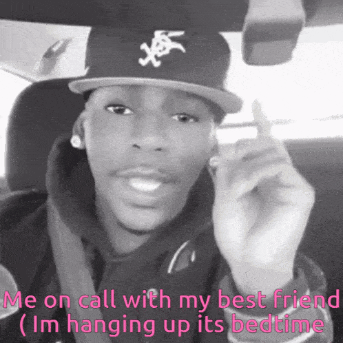 a black and white photo of a man wearing a hat with the words me on call with my best friend