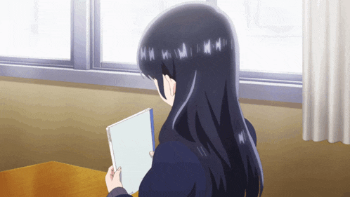 a girl with long black hair is looking out a window while holding a book