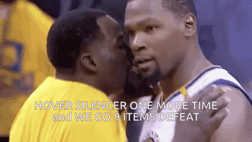a basketball player is kissing another player on the forehead .