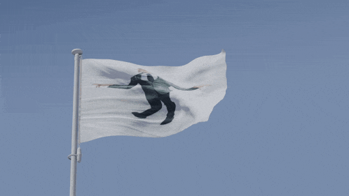 a white flag with a picture of a man in a suit