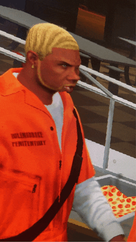 a man in an orange jumpsuit has the word penitentiary on his shirt