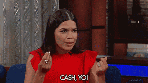 a woman in a red dress says cash yo while sitting in a chair