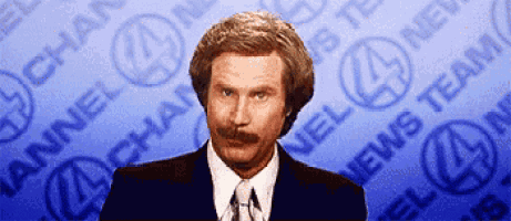 a man in a suit and tie is standing in front of a channel 4 news team background