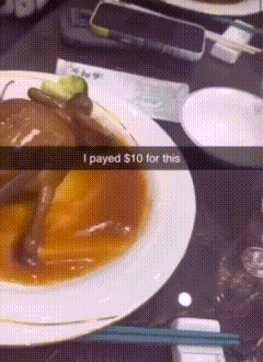 a plate of food on a table with a snap that says i paid $ 10 for this