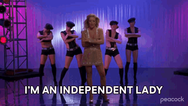 a peacock ad shows a woman dancing with the words i 'm an independent lady below her