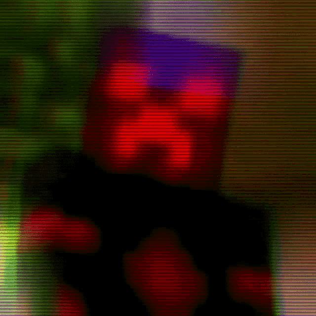 a blurry picture of a person holding a gun with a red and purple light behind them .