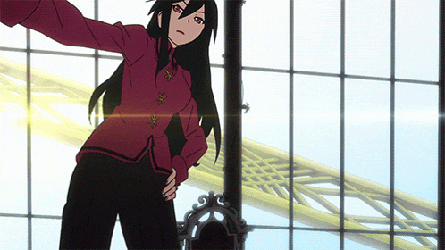 a girl with long black hair is standing in front of a large window