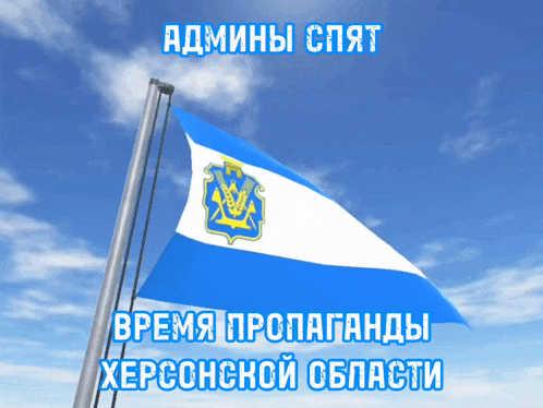 a blue and white flag is flying in the wind with a blue sky in the background