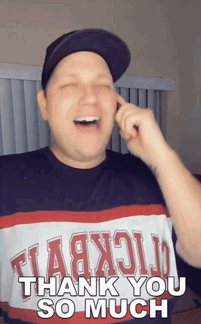 a man wearing a baseball cap and a shirt that says " thank you so much "