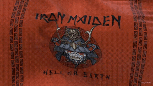 a red iron maiden shirt with a samurai head on it