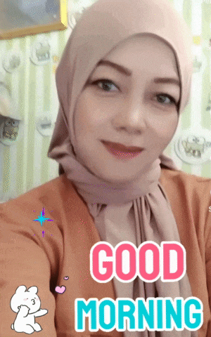 a woman wearing a hijab says good morning in pink letters