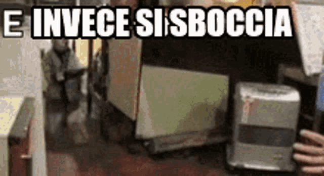 a sign that says e invece si sboccia on it in a kitchen