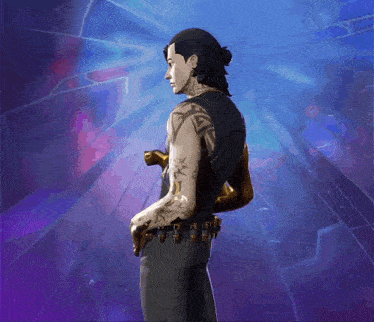 a man with a lot of tattoos is standing in front of a blue background