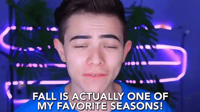 a young man with his eyes closed says fall is actually one of his favorite seasons