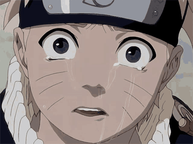a close up of a cartoon character 's face with a tear running down his cheek