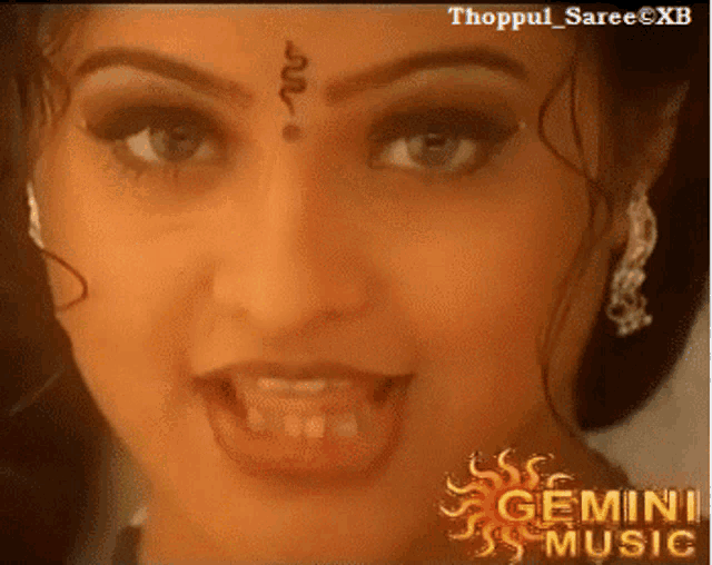 a close up of a woman 's face with the words gemini music written on the bottom