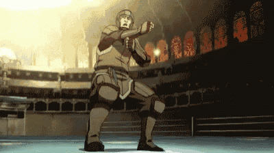 a man in armor is standing in a boxing ring with a sword in his hand .