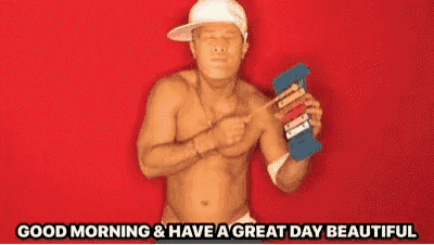 a shirtless man is holding a dumbbell and pointing at his chest with the words good morning and have a great day beautiful below him