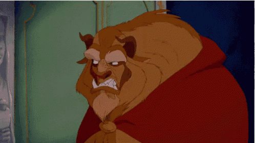 the beast from beauty and the beast has a red cape around his neck