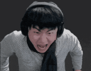 a man is wearing headphones and a scarf around his neck .