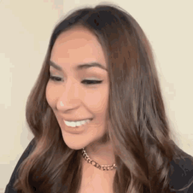 a close up of a woman wearing a choker necklace