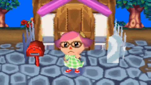 a girl with pink hair and glasses stands in front of a red mailbox