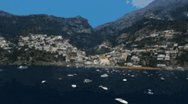 a boat is going through an archway in a cave