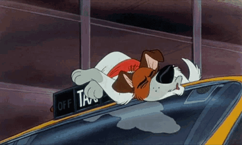 a cartoon dog laying on top of a taxi cab