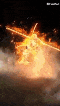 a statue of a man holding a stick is surrounded by fire and smoke .