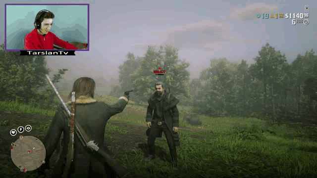 a man playing a video game with a purple screen that says tarslan tv